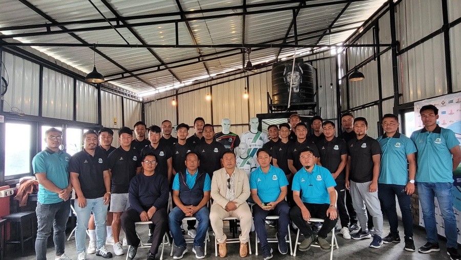 Roko Angami with management team of G-Sports FC and players after unveiling the official team jersey in Kohima on May 15. (Morung Photo)